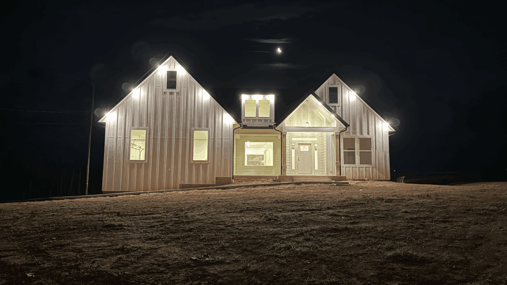 traditional house with indoor and outdoor lighting