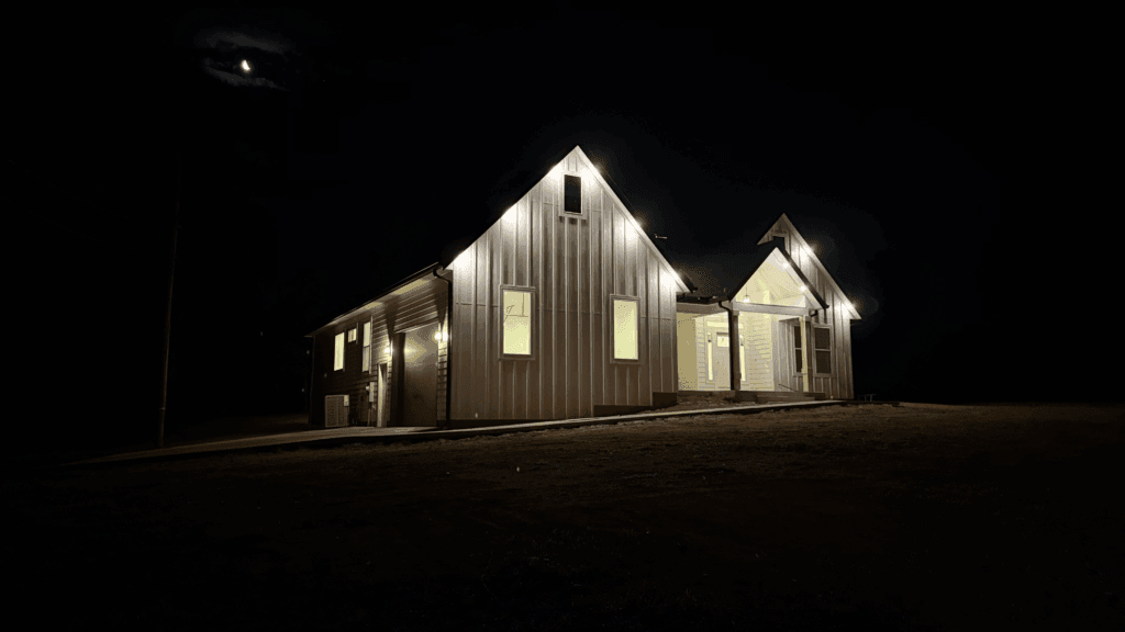 traditional house with indoor and outdoor lighting